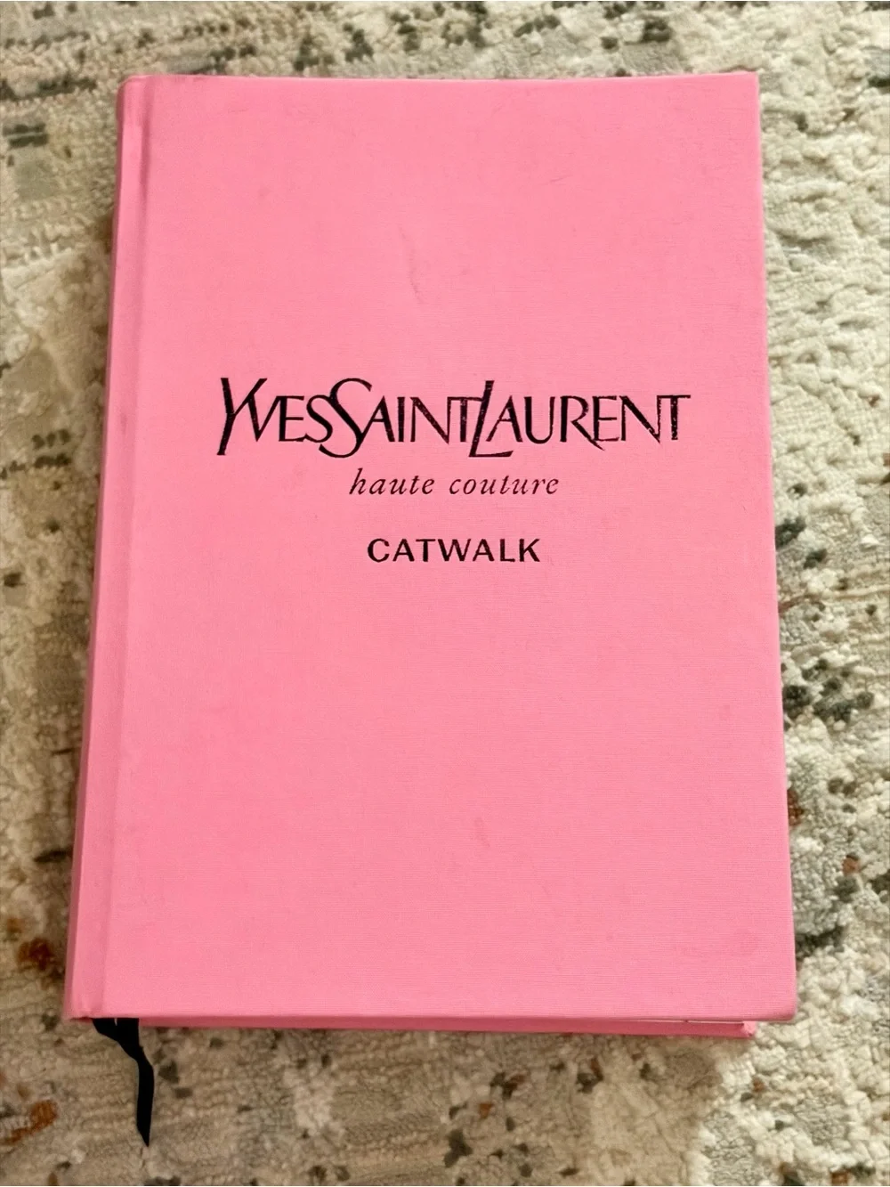 Yves Saint Laurent Pink Hardcover Haute Couture Book.